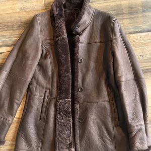 Sheepskin lined leather jacket.